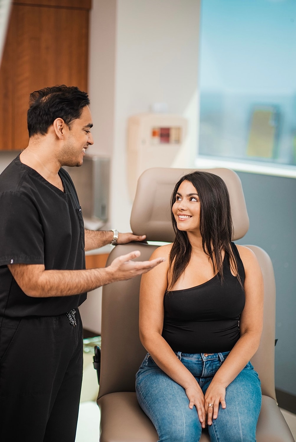 Patient consultation before injection treatment.